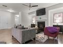 Cozy living room with a sleek fireplace, hardwood floors, and modern decor at 881 Whittington Sw Pkwy, Marietta, GA 30060