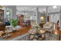 Inviting living room filled with natural light, hardwood floors, and neutral décor at 120 Masters N Dr, Peachtree City, GA 30269