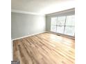 This expansive living room is illuminated by lots of natural light at 1008 Stonekirk Trce, Lawrenceville, GA 30043