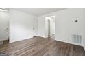 Open floor plan with vinyl floors and neutral walls, creating a bright and inviting space at 4282 Worth Nw St, Acworth, GA 30101