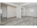 Open floor plan featuring hard surface floors and neutral paint, perfect for entertaining and comfortable living at 438 Prescott Way, Villa Rica, GA 30180