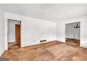 Empty living room with hardwood floors and potential at 2531 Hood Nw Ave, Atlanta, GA 30318