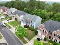 Aerial view of home showcasing the landscaping, curb appeal, and neighborhood at 1144 Simonton Hill Ct, Lawrenceville, GA 30045
