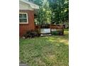 Beautiful wooden back deck outside of a red brick home at 309 Cornish Mountain Rd, Covington, GA 30014