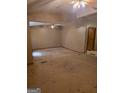 Spacious living room featuring neutral walls, ceiling fan, and lots of potential at 4298 Brookside Dr, Forest Park, GA 30297