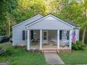 Home with a front porch offering a cozy outdoor space at 75 Grady Smith St, Grantville, GA 30220