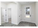Bright entryway featuring durable floors, neutral paint, and access to the interior at 481 Cantrell Drive, Dallas, GA 30157
