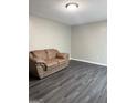 Living room featuring gray walls and dark flooring at 599 Cherry Ln, Jonesboro, GA 30238