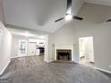 Inviting living room with fireplace, wood-look floors, and neutral paint at 530 Austin Dr, Mcdonough, GA 30252