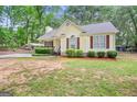 Lovely single-story home featuring red shutters and a well-maintained lawn at 40 Green Leaf Cir, Hampton, GA 30228