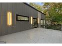 Exterior patio boasting a large, gray stamped-concrete surface and dark metal railings at 1153 Dawn View Nw Ln, Atlanta, GA 30327
