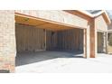 Spacious two-car garage interior with unfinished walls at 8828 Patricia Rose, Douglasville, GA 30134