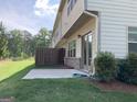 The backyard offers a patio and green space for outdoor enjoyment at 6398 Lanier Harbor Lndg, Buford, GA 30518