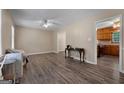 Spacious living room features sleek hardwood flooring, neutral walls, and ample natural light at 632 Cloudland Dr, Stockbridge, GA 30281