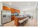 Spacious kitchen featuring stainless steel appliances and a center island with seating at 5237 Halcyon Ct, Morrow, GA 30260