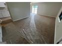 Bright living room featuring neutral carpet, and sliding glass doors to the outdoor patio at 1466 Pine Log Ne Rd # A, Conyers, GA 30012