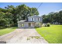 Inviting two-story home with ample yard space and curb appeal at 6369 Havenridge Dr, Riverdale, GA 30274
