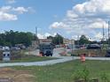 Street view of a busy street corner with a drug store and general retail at 13090 Brown Bridge Rd, Covington, GA 30016