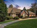 Beautiful home with manicured lawn and stone accents, presenting a welcoming curb appeal at 232 Darwish Dr, Mcdonough, GA 30252