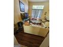 Cozy living room featuring sofas, and a bright, open floor plan at 6296 Marbut Farms Trl, Lithonia, GA 30058