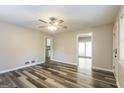 Open living room showcasing a ceiling fan and attractive flooring at 338 Mount Zion Rd, Hapeville, GA 30354