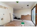 An interior view of a room undergoing renovation featuring sliding doors with bare studs at 8005 Big Rock Dr, Douglasville, GA 30134