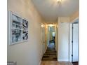 Inviting hallway with neutral walls and stylish flooring at 4511 Ravenwood Pl # 70, Union City, GA 30291
