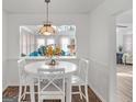Cozy dining area featuring a round table and views to the living room at 5875 Highway 92, Fairburn, GA 30213