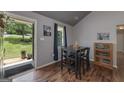 Cozy dining area features modern furnishings, stylish decor and wood floors at 40 Salem Ct, Mcdonough, GA 30252