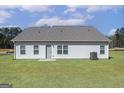 Expansive backyard featuring a well-maintained lawn, perfect for outdoor activities and relaxation at 378 Cantrell Drive, Dallas, GA 30157