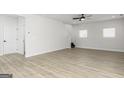Spacious, bright living room with new hardwood floors and lots of natural light at 635 Cantrell Drive, Dallas, GA 30157