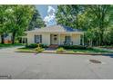 Inviting single-story home boasts a covered porch, and manicured landscaping enhancing its curb appeal at 3170 Butler Se Ave, Covington, GA 30014