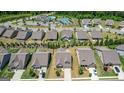 An aerial view of the neighborhood and the home at 100 Maple Leaf Rd, Sharpsburg, GA 30277