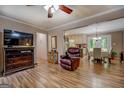 Inviting living space with modern wood-look flooring, a dining area, and seamless flow to the kitchen at 357 Oak Hill Rd, Covington, GA 30016
