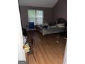 A view into the bedroom with hardwood floors at 4752 Browns Mill Ferry, Lithonia, GA 30038