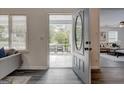 Inviting front entrance with stylish door and views of the bright and airy living space at 203 Brannan Rd, Mcdonough, GA 30253