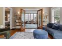 Inviting living room with hardwood floors and view to sunroom at 239 Kings Hwy, Decatur, GA 30030
