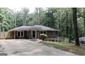 Beautiful brick home with mature trees, offering privacy and curb appeal at 288 Harper Se Rd, Atlanta, GA 30315
