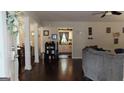 Inviting living room with hardwood floors and an open concept layout leading to the kitchen at 288 Harper Se Rd, Atlanta, GA 30315