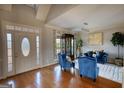 Welcoming living room features hardwood floors, and bright natural light at 4180 Mount Paran Dr, Social Circle, GA 30025