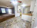 Open-concept kitchen features stylish floors, wood countertops and modern appliances at 578 Lakeridge Se Cir, Conyers, GA 30094
