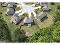 Aerial shot showcases the home's position within a cul-de-sac neighborhood and the expansive fenced-in backyard at 5016 Brass Ct, Locust Grove, GA 30248