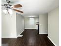 Spacious living room with hardwood floors, neutral paint, and abundant natural light at 3317 Renault Se Rd, Atlanta, GA 30354
