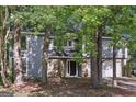 Charming two-story home with a stone accent, attached garage and professionally landscaped front yard at 5362 Kelleys Mill Cir, Stone Mountain, GA 30088