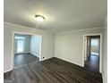 Spacious living room features wood floors, neutral colored walls, and abundant natural light at 4487 Greenleaf Sw Cir, Atlanta, GA 30331