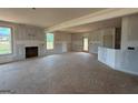 Bright living area featuring unfinished walls, multiple windows and an open layout ready for customization at 242 Old Jackson Rd, Mcdonough, GA 30252