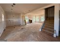 Spacious living room area with multiple windows for natural light at 1916 King Mill Rd, Mcdonough, GA 30252
