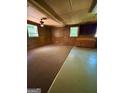 Expansive living room with carpet and two-toned flooring offering great potential for customization at 585 Huddleston Rd, Fayetteville, GA 30214