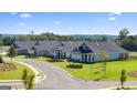 Beautiful homes lining a street with manicured lawns and lush trees in a peaceful neighborhood at 604 Parnassus Rd # 006, Locust Grove, GA 30248