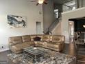 Comfortable living room boasts an oversized sectional sofa and stylish decor at 3970 Lagrone St, Powder Springs, GA 30127